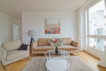 Wohnzimmer - 4-Zimmer-Wohnung mit Blick über Berlin