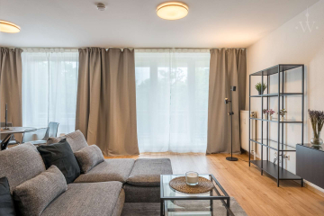 Wohnzimmer - Geräumige 3-Zimmerwohnung mit Balkon zum ruhigen Innenhof