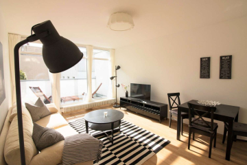 Wohnzimmer - Ansprechend möbliertes 2-Zimmer-Apartment – ruhig, aber mittendrin