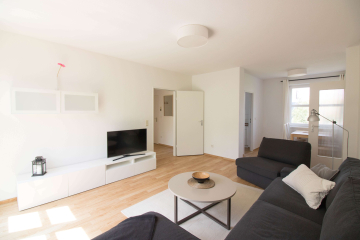 Wohnzimmer - Modern möblierte 3-Zimmer-Wohnung im Herzen Berlins