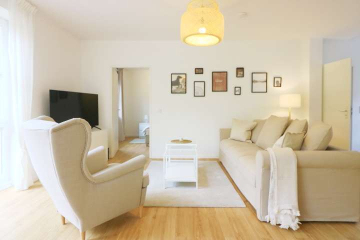 Wohnzimmer - Lichtdurchflutete 2-Zimmer-Wohnung mit loftartigem Wohnbereich