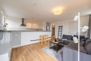 Wohnzimmer - Modern möblierte 2-Zimmer-Wohnung mit Blick über Berlin Schöneberg