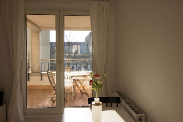 Living and dining area - Modern furnished 3-room flat with large balcony