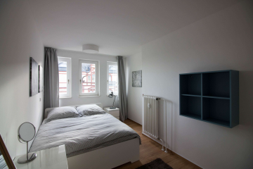 Schlafzimmer - Modern möblierte 2-Zimmer-Wohnung in zentraler Lage