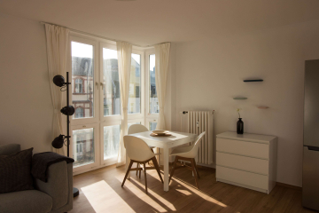 Wohnzimmer - Modern möblierte 2-Zimmer-Wohnung in zentraler Lage