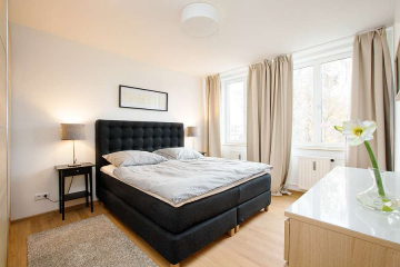 Schlafzimmer - Moderne 3-Zimmer-Wohnung mit Balkon an der Spree