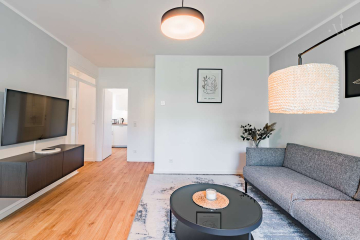 Living room - Our modern 2-room flat above the rooftops of Berlin