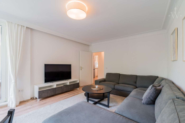 Wohnzimmer - Moderne 3-Zimmer-Wohnung mit großem Balkon