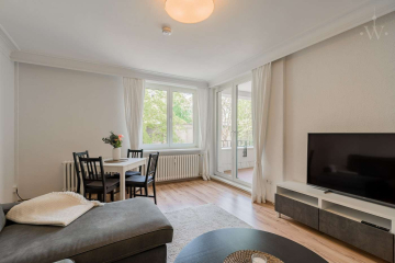 Wohnzimmer - Moderne 3-Zimmer-Wohnung mit großem Balkon