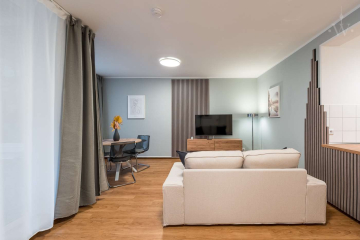 Wohnzimmer - Möbliertes 2-Zimmer-Apartment in ruhiger Lage mit großem Balkon