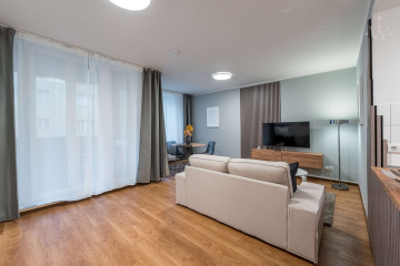 Wohnzimmer - Möbliertes 2-Zimmer-Apartment in ruhiger Lage mit großem Balkon