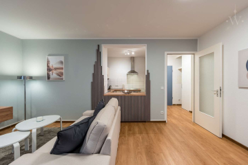 Wohnzimmer - Möbliertes 2-Zimmer-Apartment in ruhiger Lage mit großem Balkon