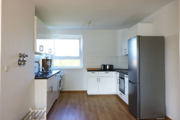 Küche - Modern eingerichtete 4-Zimmer-Dachgeschosswohnung mit sonnigem Balkon zum ruhigen Innenhof