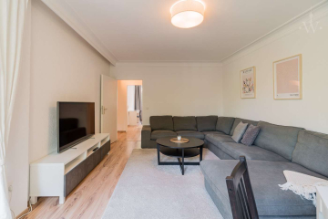 Wohnzimmer - Moderne 3-Zimmer-Wohnung mit großem Balkon