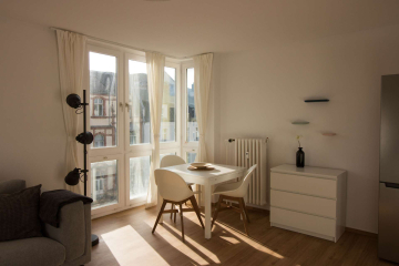 Wohnzimmer - Modern möblierte 2-Zimmer-Wohnung in zentraler Lage