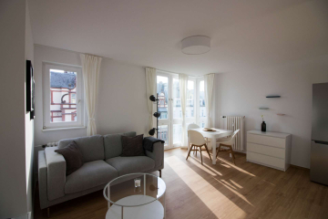 Wohnzimmer - Modern möblierte 2-Zimmer-Wohnung in zentraler Lage