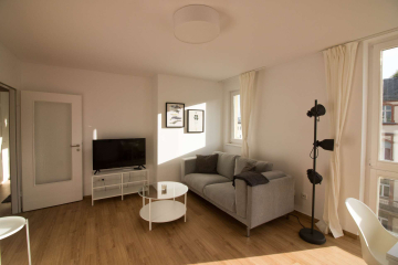 Wohnzimmer - Modern möblierte 2-Zimmer-Wohnung in zentraler Lage